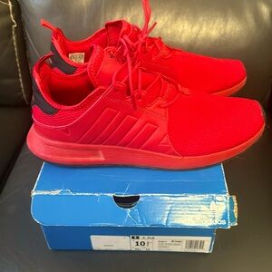 Red adidas, 10.5 men’s size, like new, worn only three times
